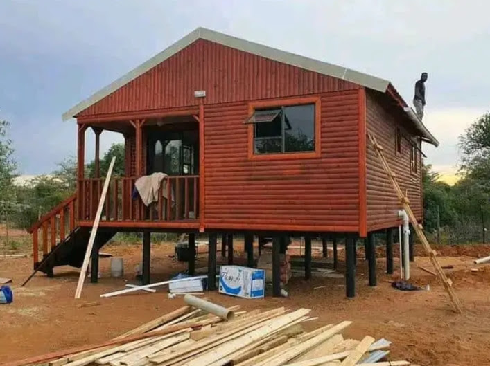 Log Cabins project 5 by Hot Mix Holdings